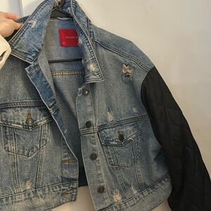 Denim jacket with quilted sleeves